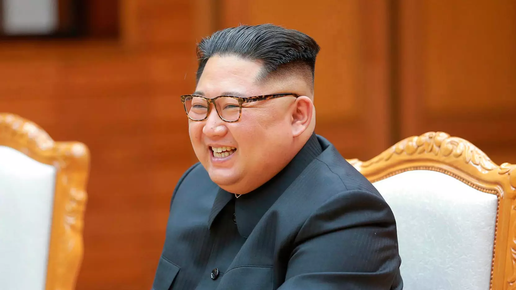Russia TV Station Accused Of Photoshopping Image Of Kim Jong-Un Smiling