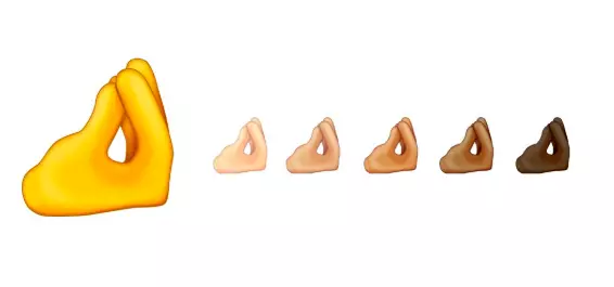 The new 'pinching fingers' emoji is going down well online (