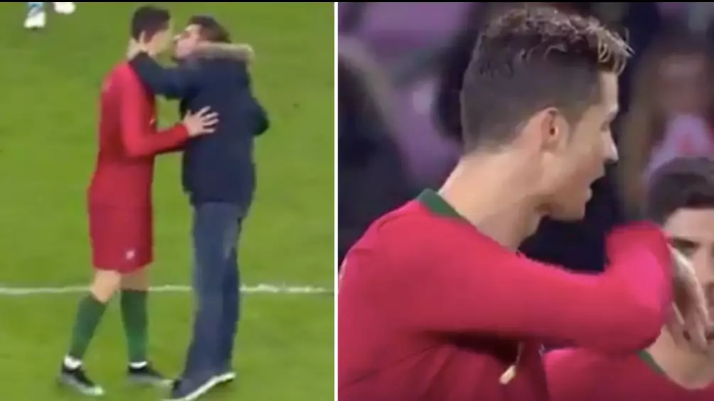 Pitch Invader Attempts To Kiss Cristiano Ronaldo During Portugal vs Netherlands Match 