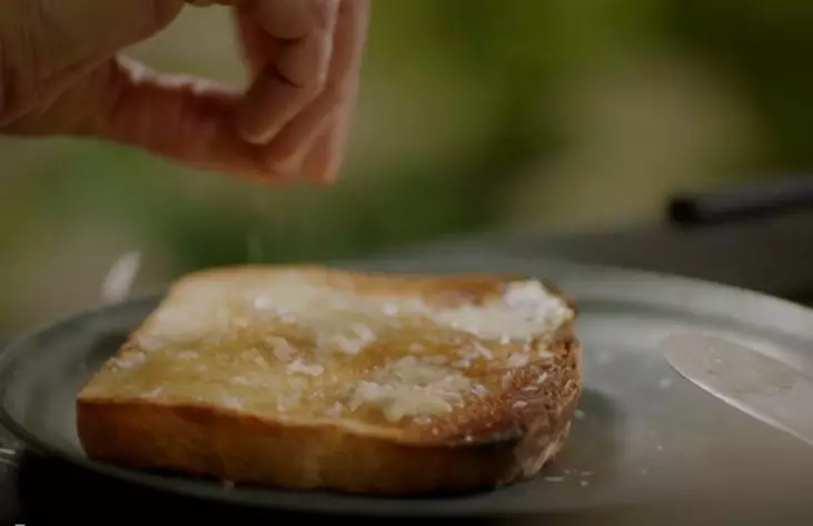 The telly cook then butters the toast for a second time using unsalted butter - and adds a sprinkling of sea salt flakes (