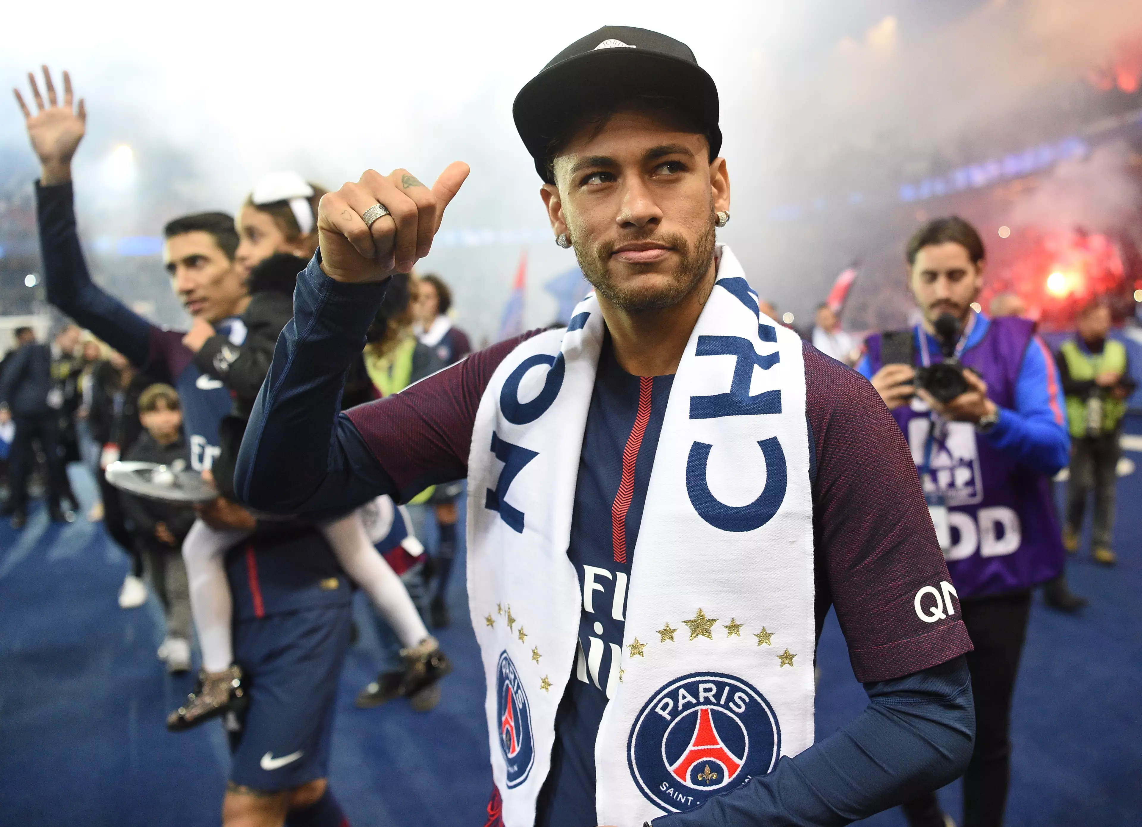 Neymar celebrates after winning the league title. Image: PA