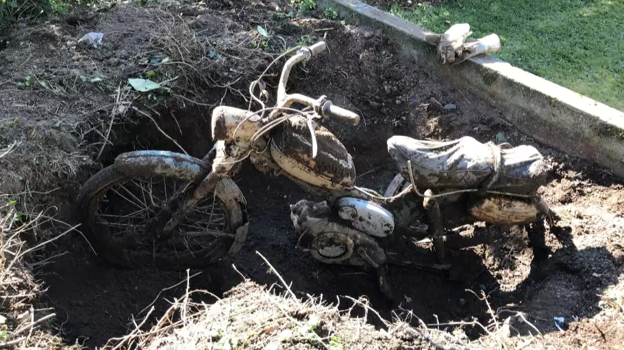 Dad Surprised To Find Entire Motorbike Buried In His Back Garden
