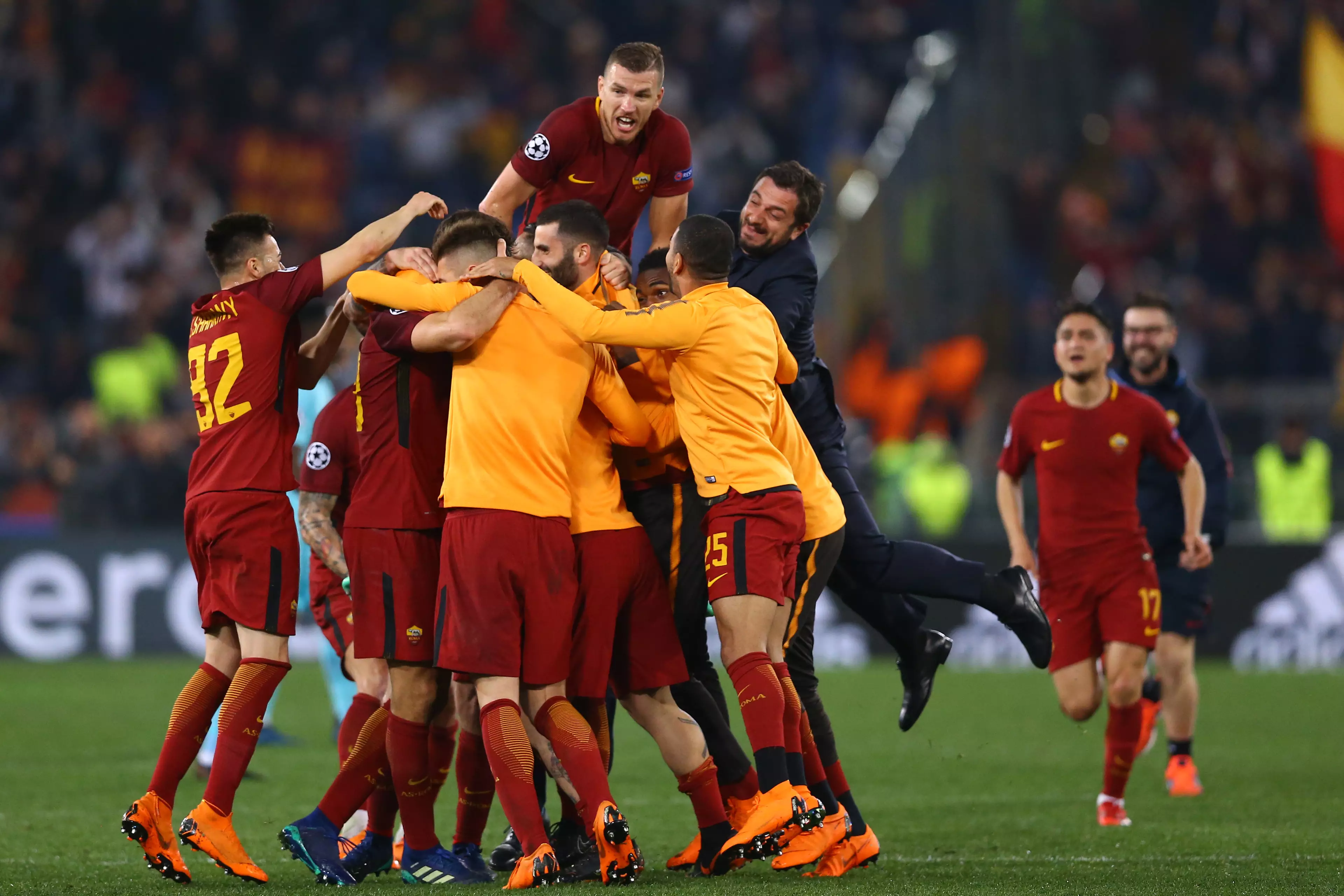 AS Roma players celebrate at the final whistle. Image: PA