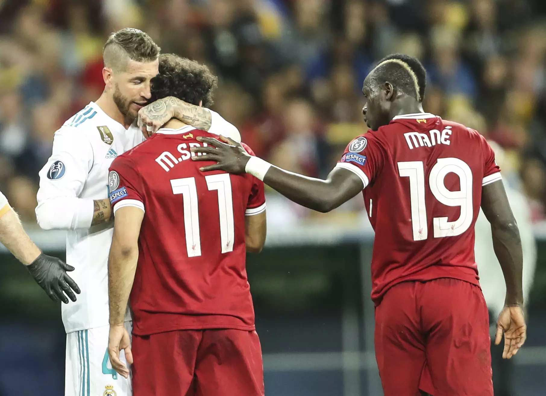 Ramos consoles Salah. Image: PA