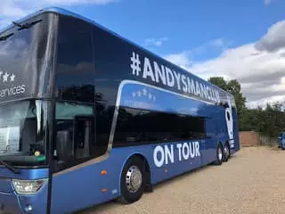 The tour bus took them across the country.