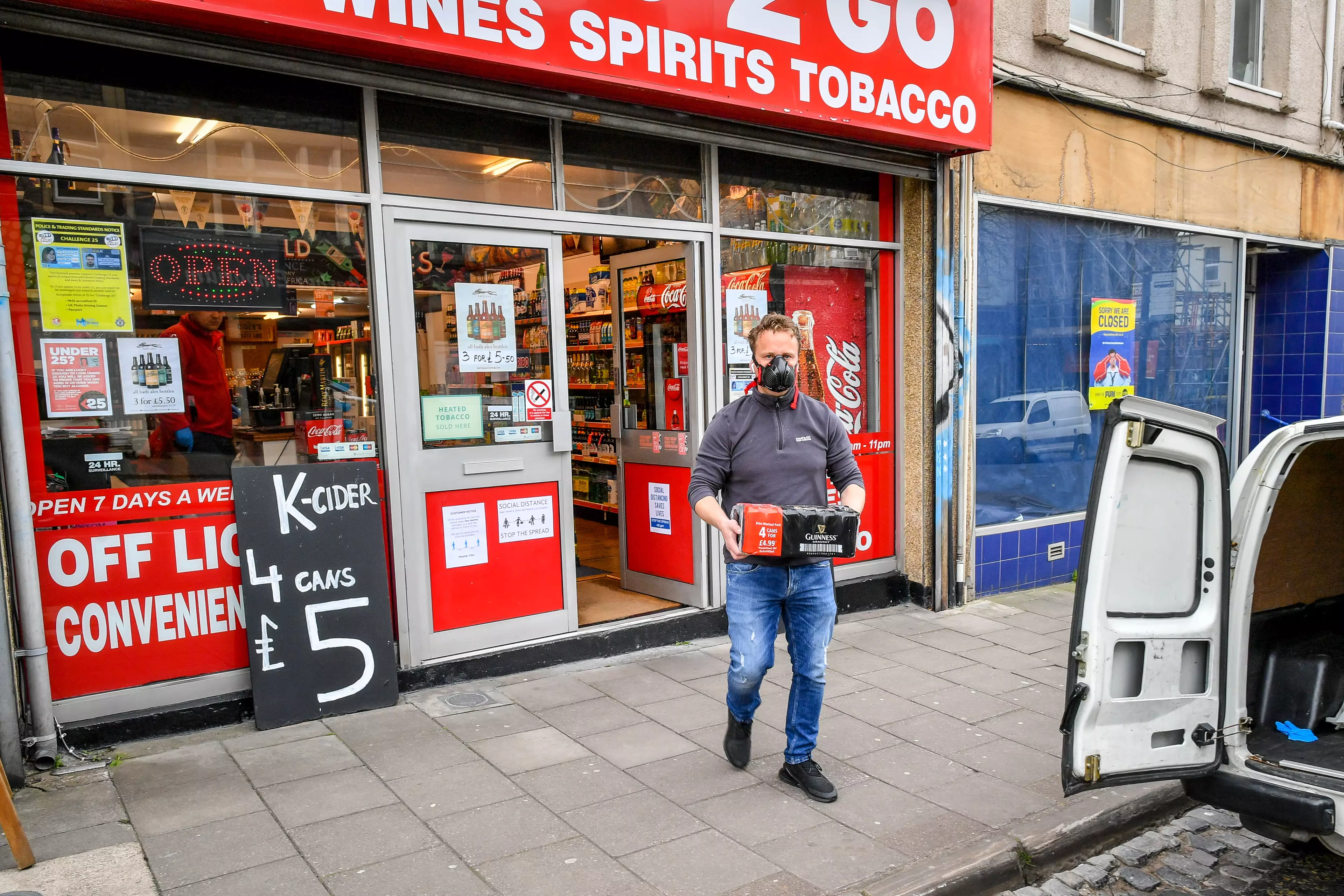 A customer buys beer from an off-licence.