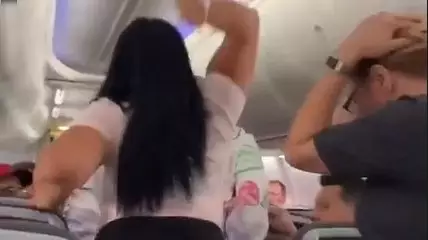 Woman Filmed Smashing Partner Over Head With A Laptop On Plane