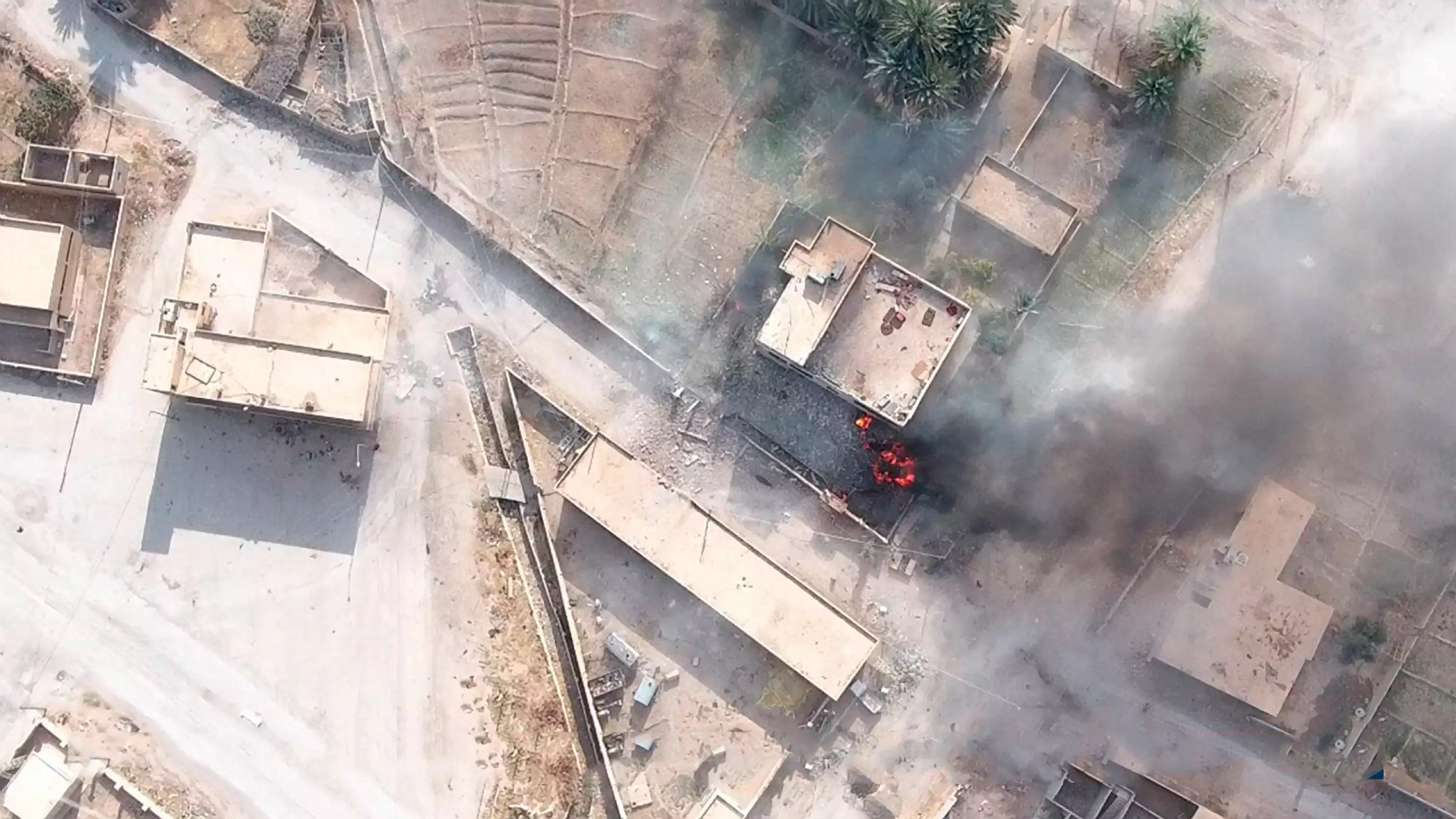 Image taken from a propaganda drone video showing Islamic State suicide bomber attack on a Syrian Army positions (
