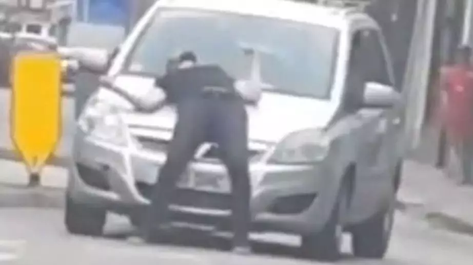 Man Walks In Front Of Car And Slumps To Ground In 'Crash For Cash' Stunt