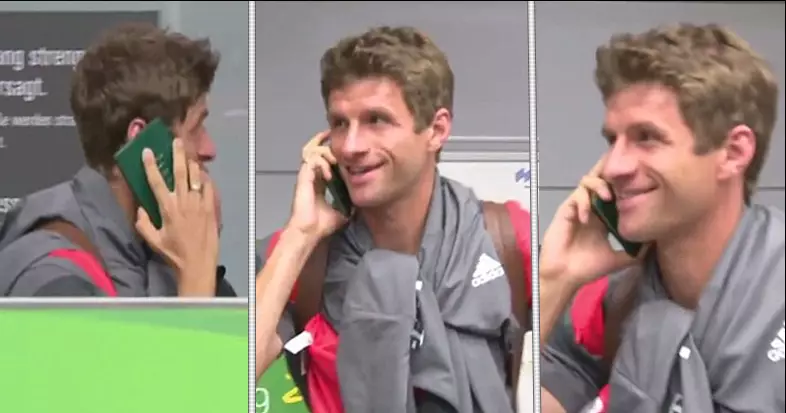 WATCH: Thomas Muller Dodges The Press By Having A Phone Call...On His Passport