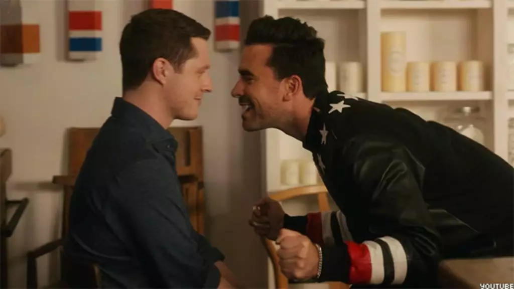 David (Dan Levy) performs a rendition of The Best for his husband Patrick (Noah Reid) (