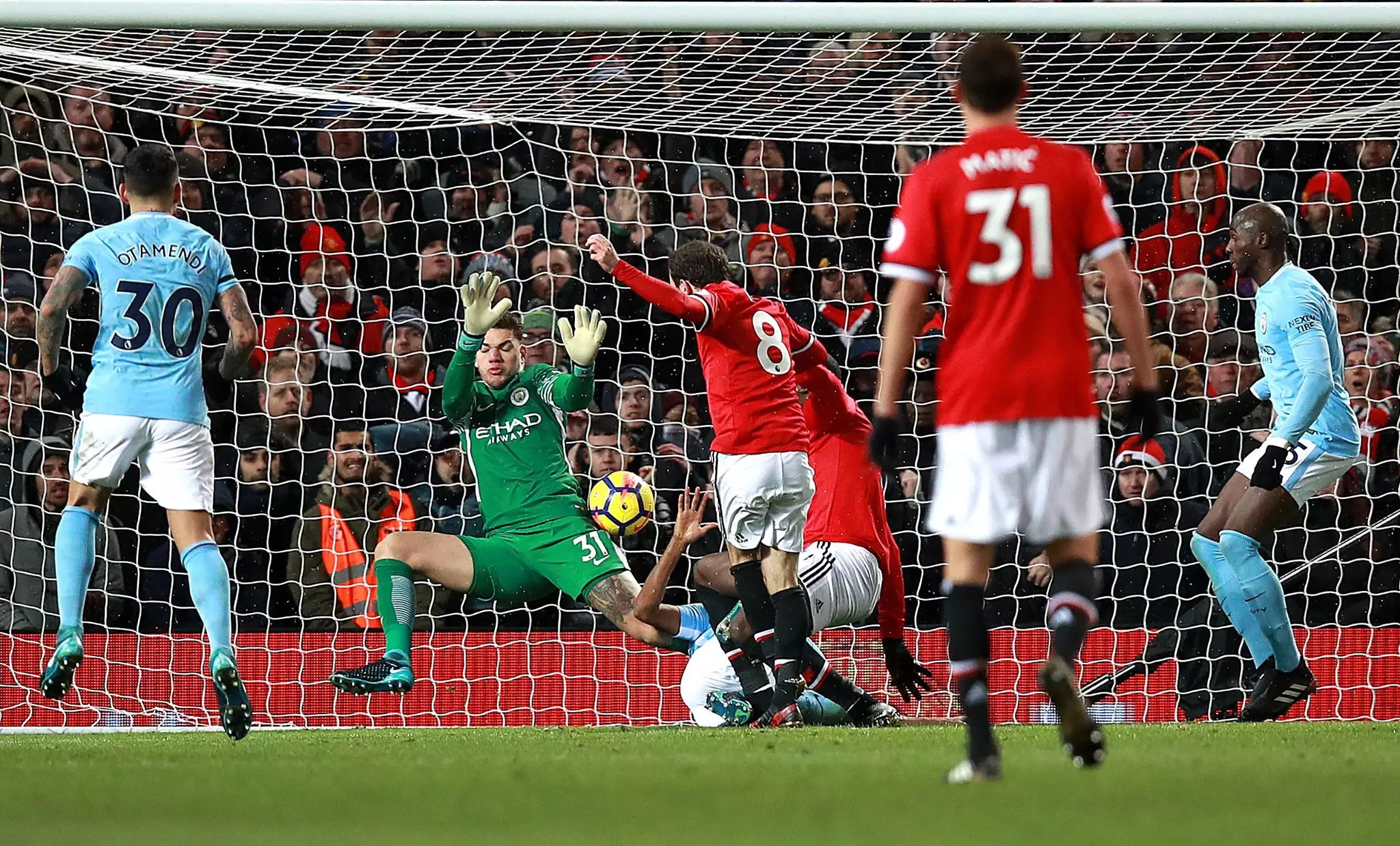 Ederson saves a shot against United. Image: PA