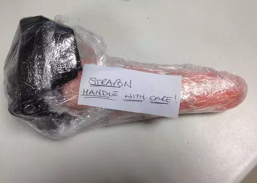 The sex toy wrapped up and labelled... just in case.