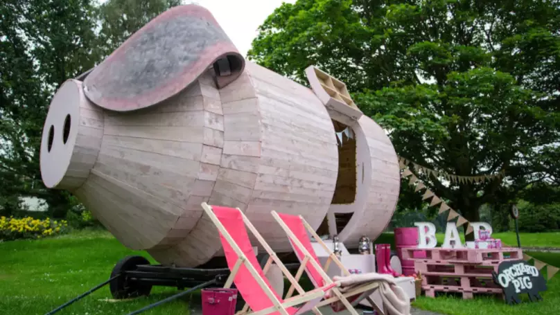 Orchard Pig cider has built a massive wooden pig for you to stay in.