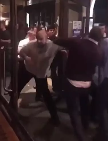 The violence spilled out onto the street as two men tried to get back into the pub.