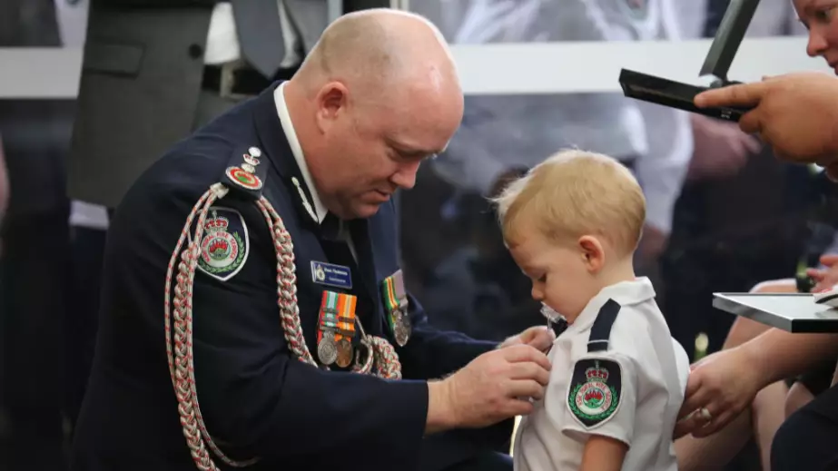 Toddler Son Of Volunteer Firefighter Receives Medal For Dad Killed In Bushfires
