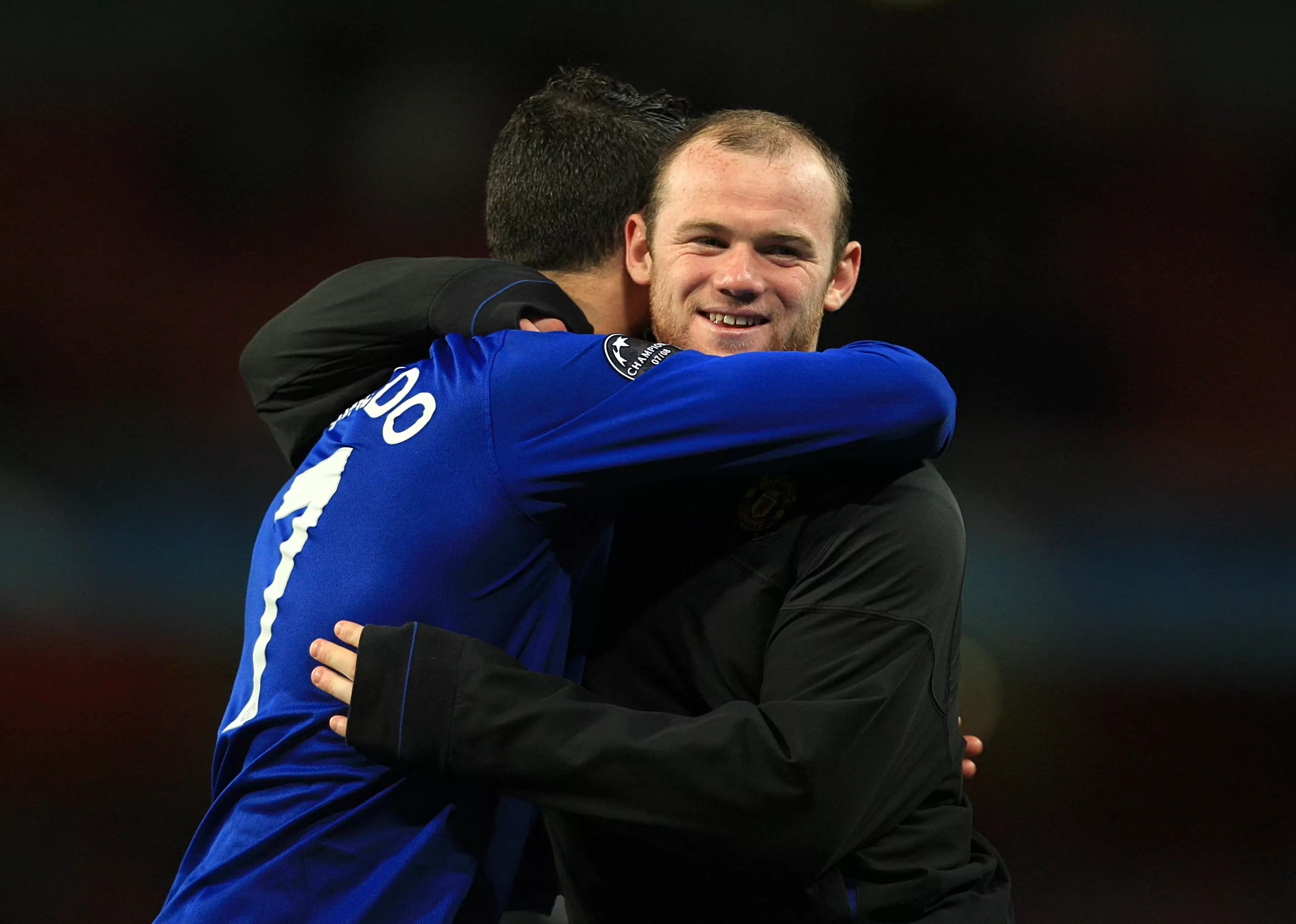 Rooney and Ronaldo embrace. Image: PA Images
