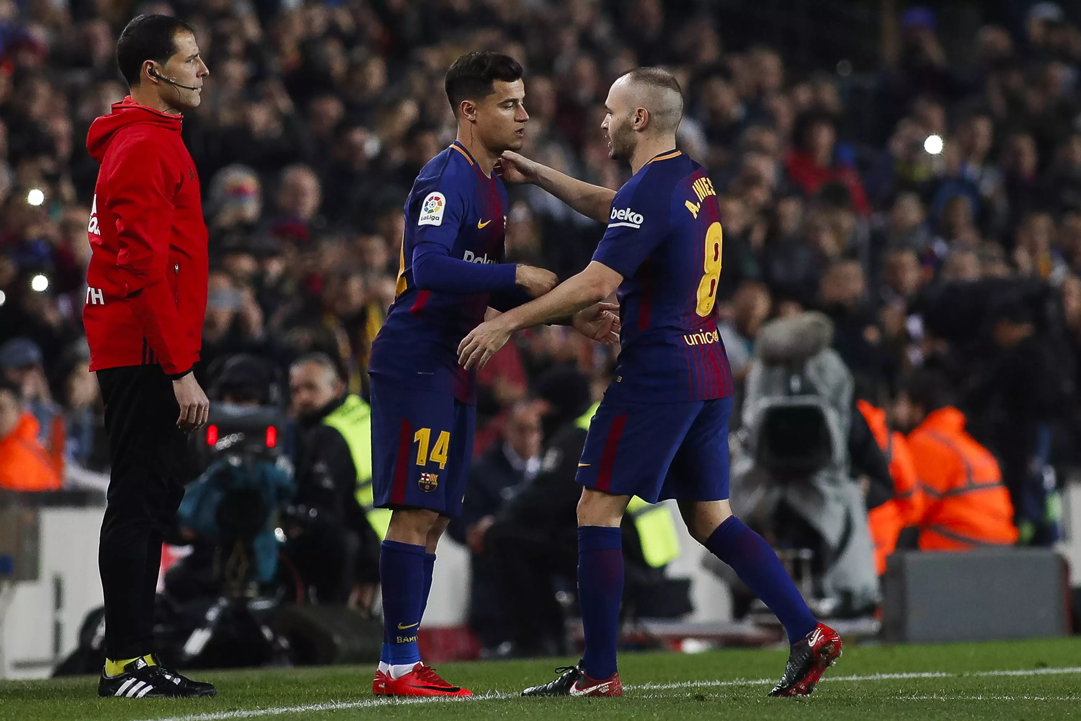 Coutinho on for Iniesta