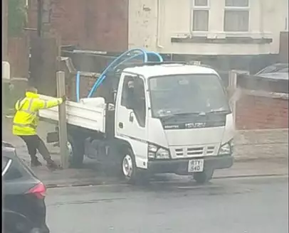 The workmen had to undo their work and pull on the posts to squeeze the van back out.