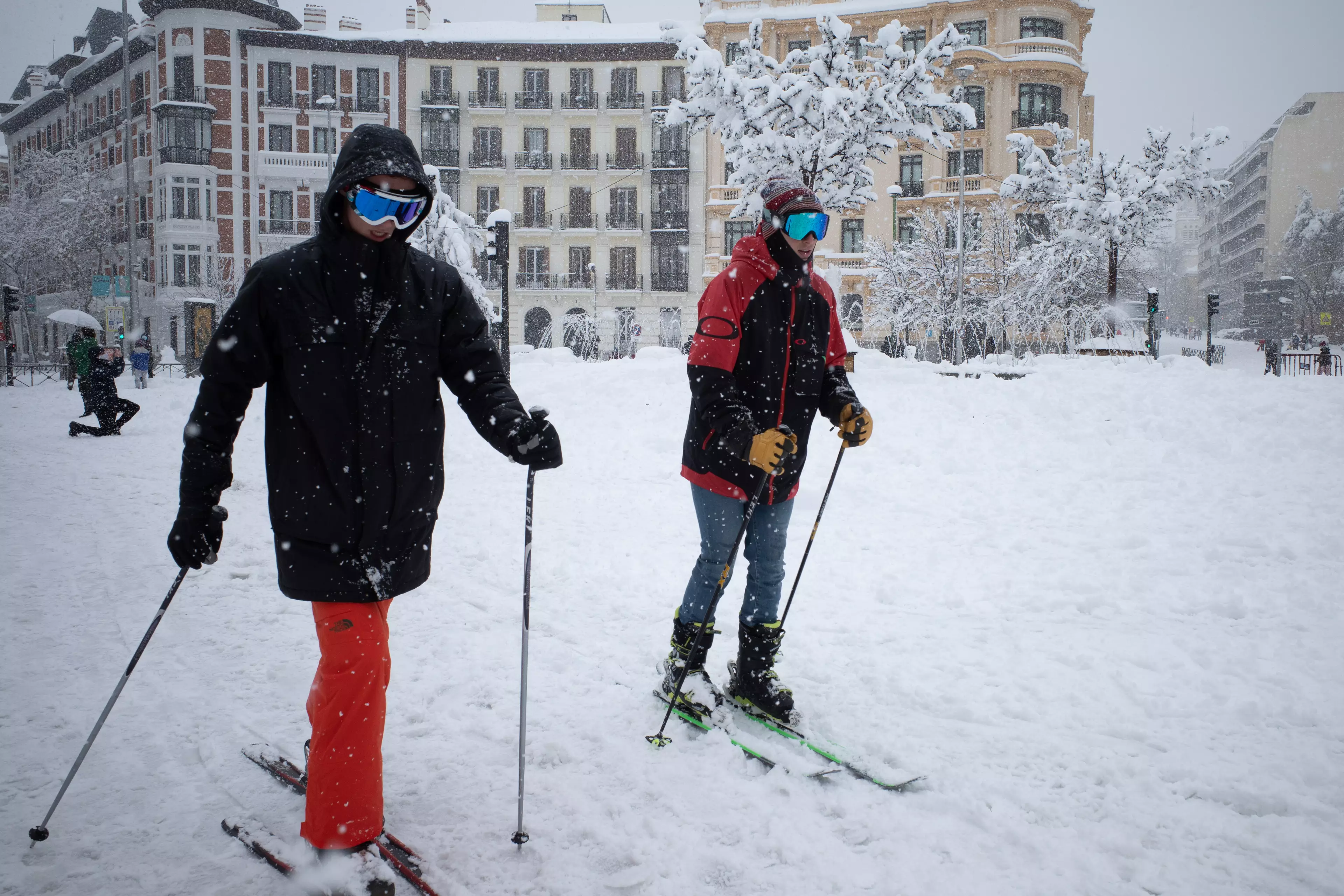 Some in Madrid have been using skis to get around.