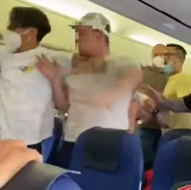 Two passengers had to be restrained following a fight on a KLM flight from Amsterdam to Ibiza.