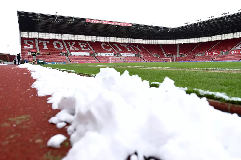 Snow has had to be cleared from the pitch ahead of Stoke's Match.
