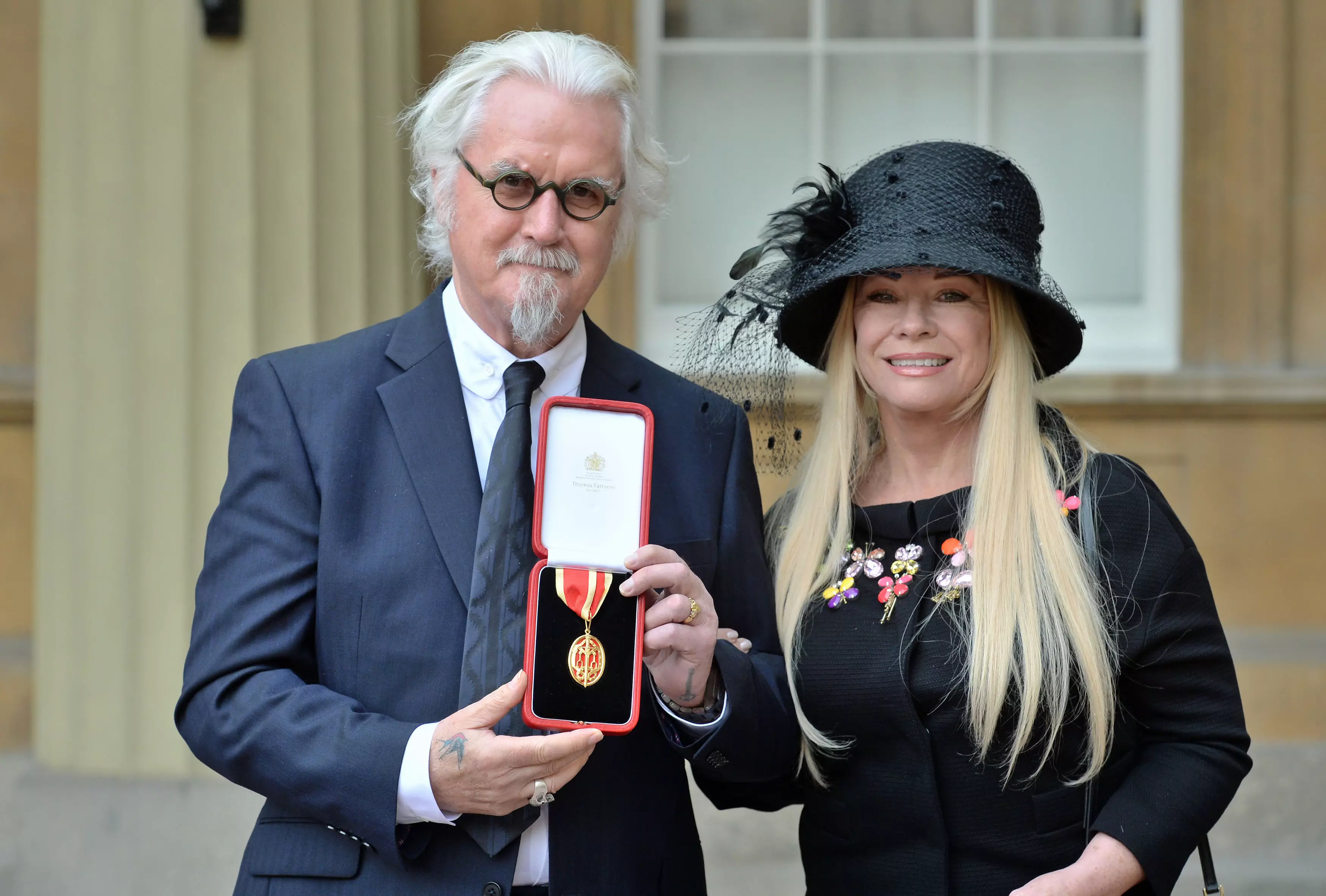 Sir Billy Connolly with his wife Pamela Stephenson after being knighted by the Duke of Cambridge.