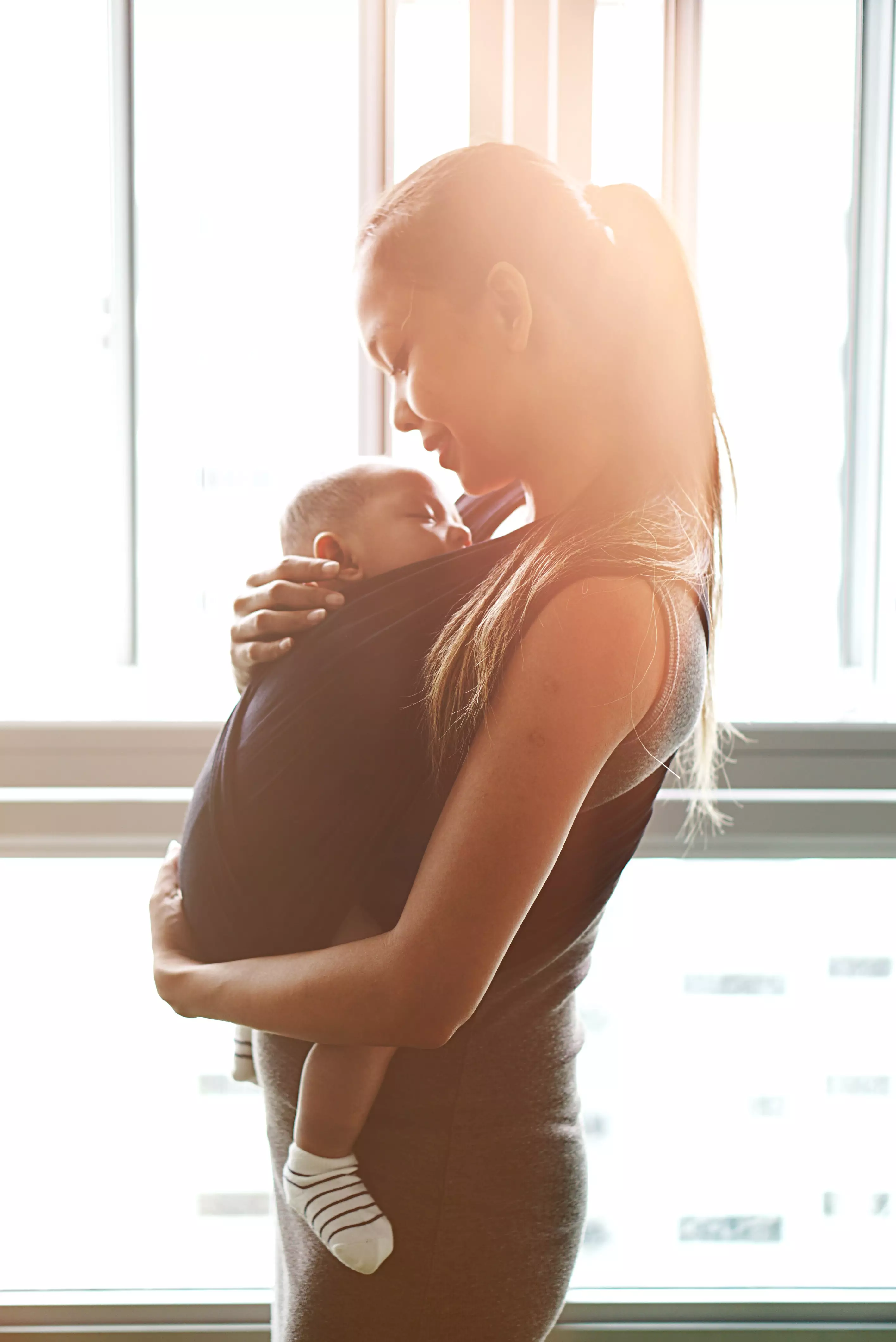 Woman with baby - Unsplash