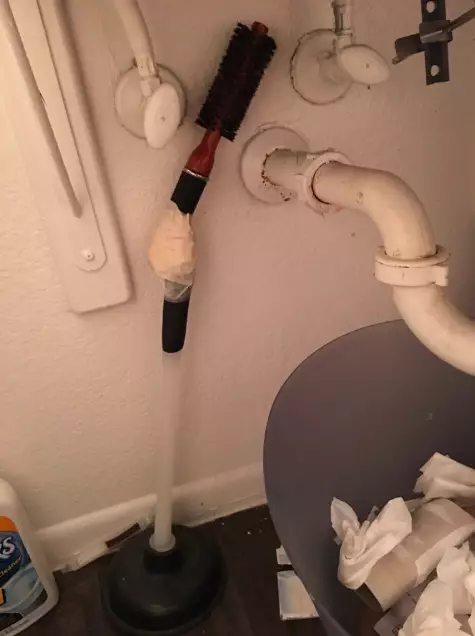A toilet brush extension... handy (