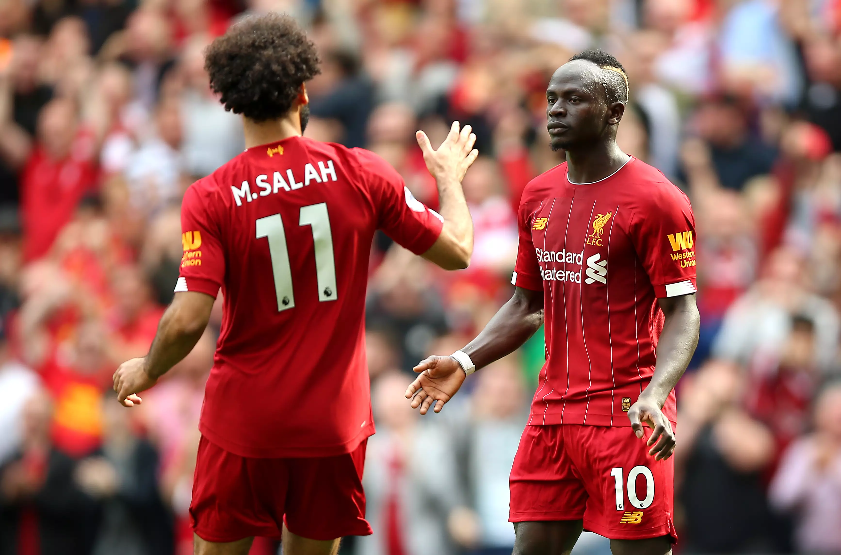 Mane and teammate Mohamed Salah in action today (Image