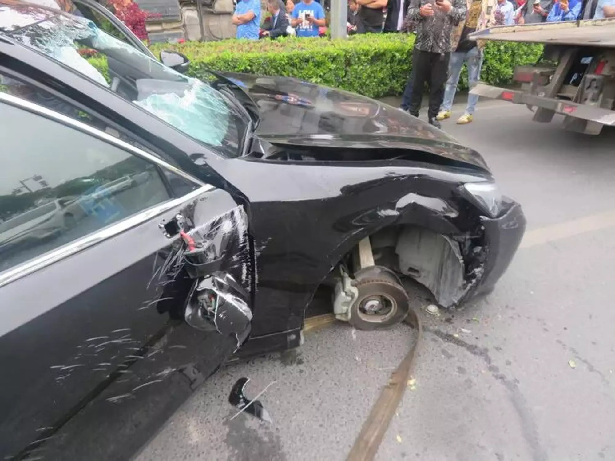 The black Toyota was sent careering off the road and over a traffic island.