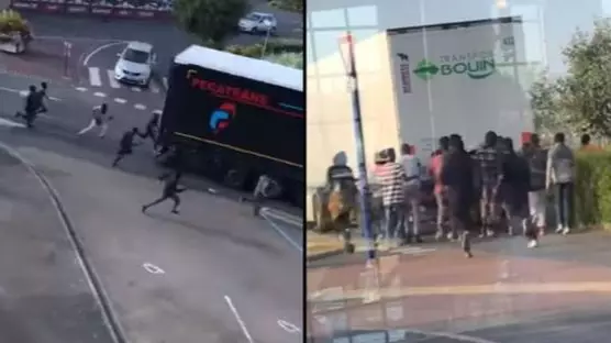 Shocking Scenes As Refugees Chase Down Lorry In Desperate Attempt To Cross UK Border