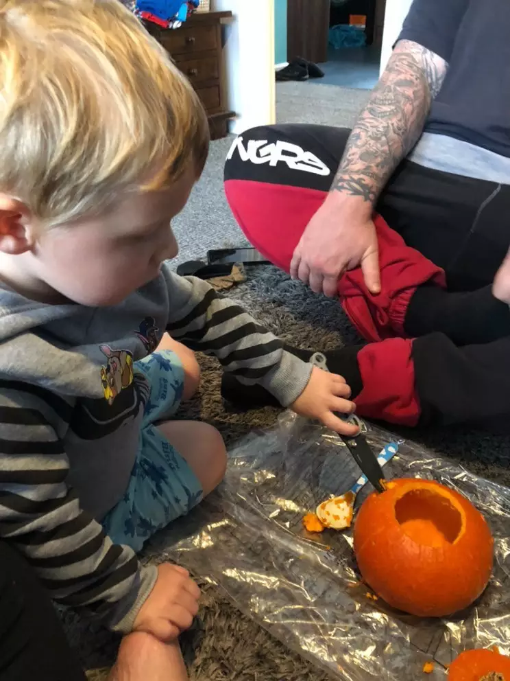 Jax carved his own pumpkin last Halloween.