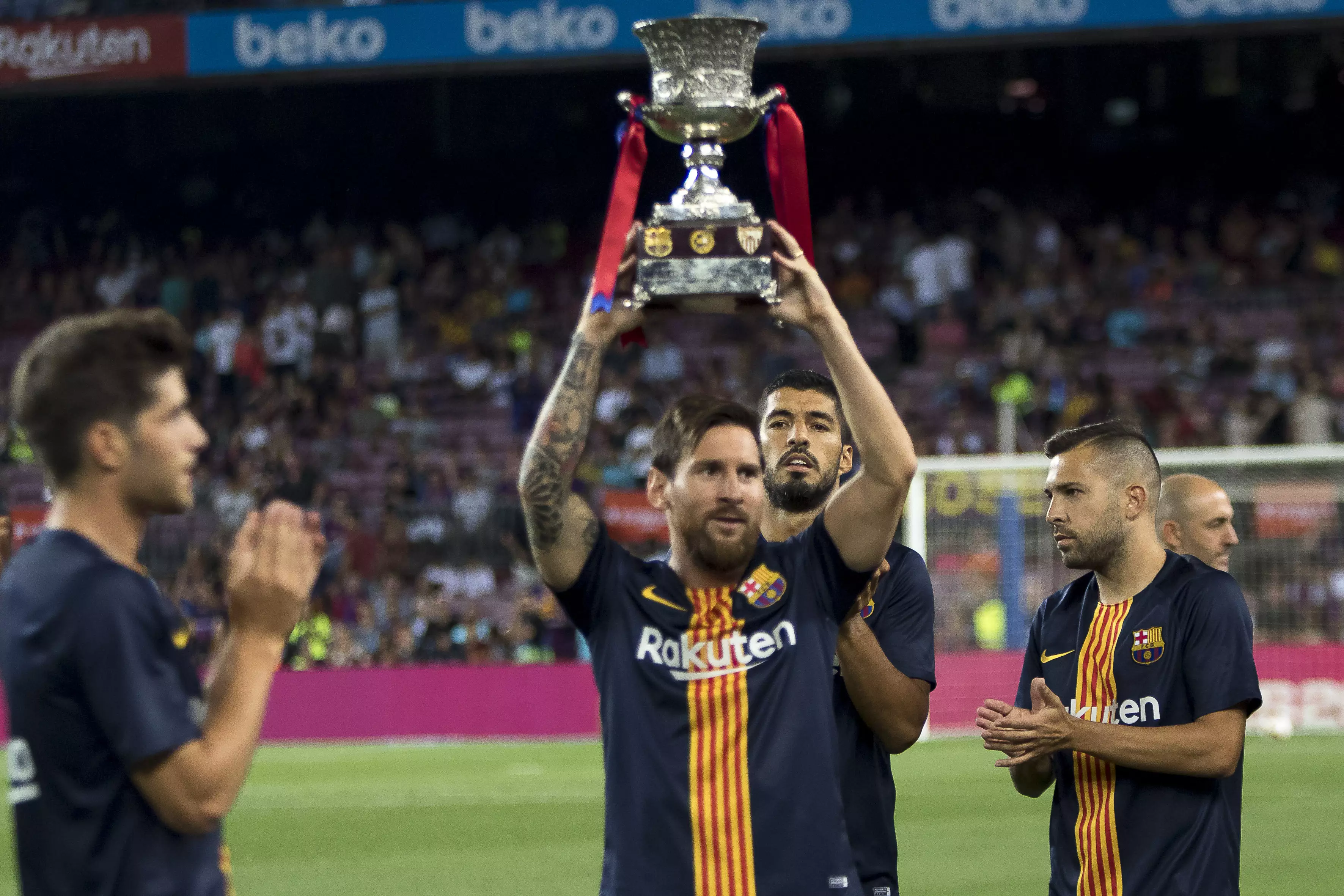 Messi with the La Liga trophy. Image: PA Images