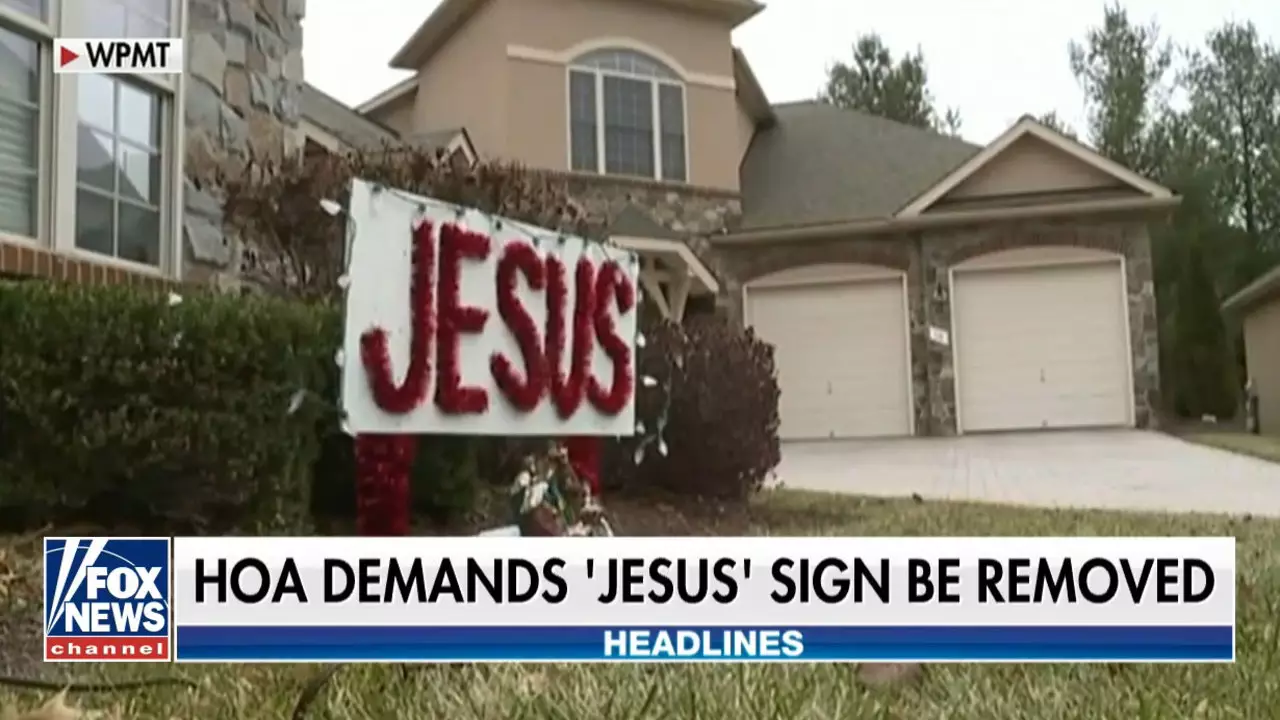 ​Family Told To Take Down Offensive 'Jesus' Sign By Neighbours