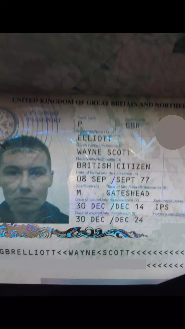 Amongst the photos on the phone was a picture of Elliott's passport.
