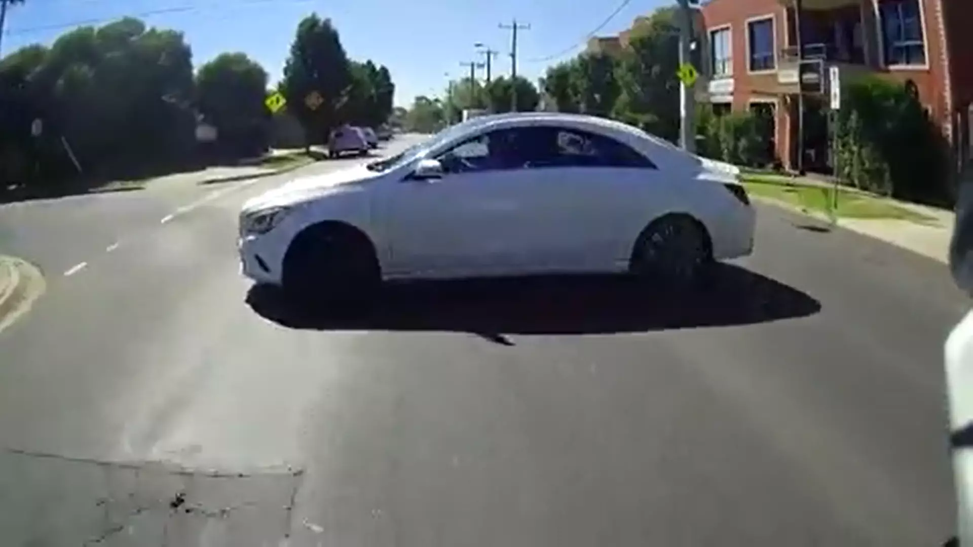 Opinion Divided Over Video Showing Motorbike Crashing Into Mercedes