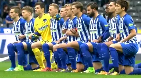 Hertha Berlin Players And Coaches Take A Knee