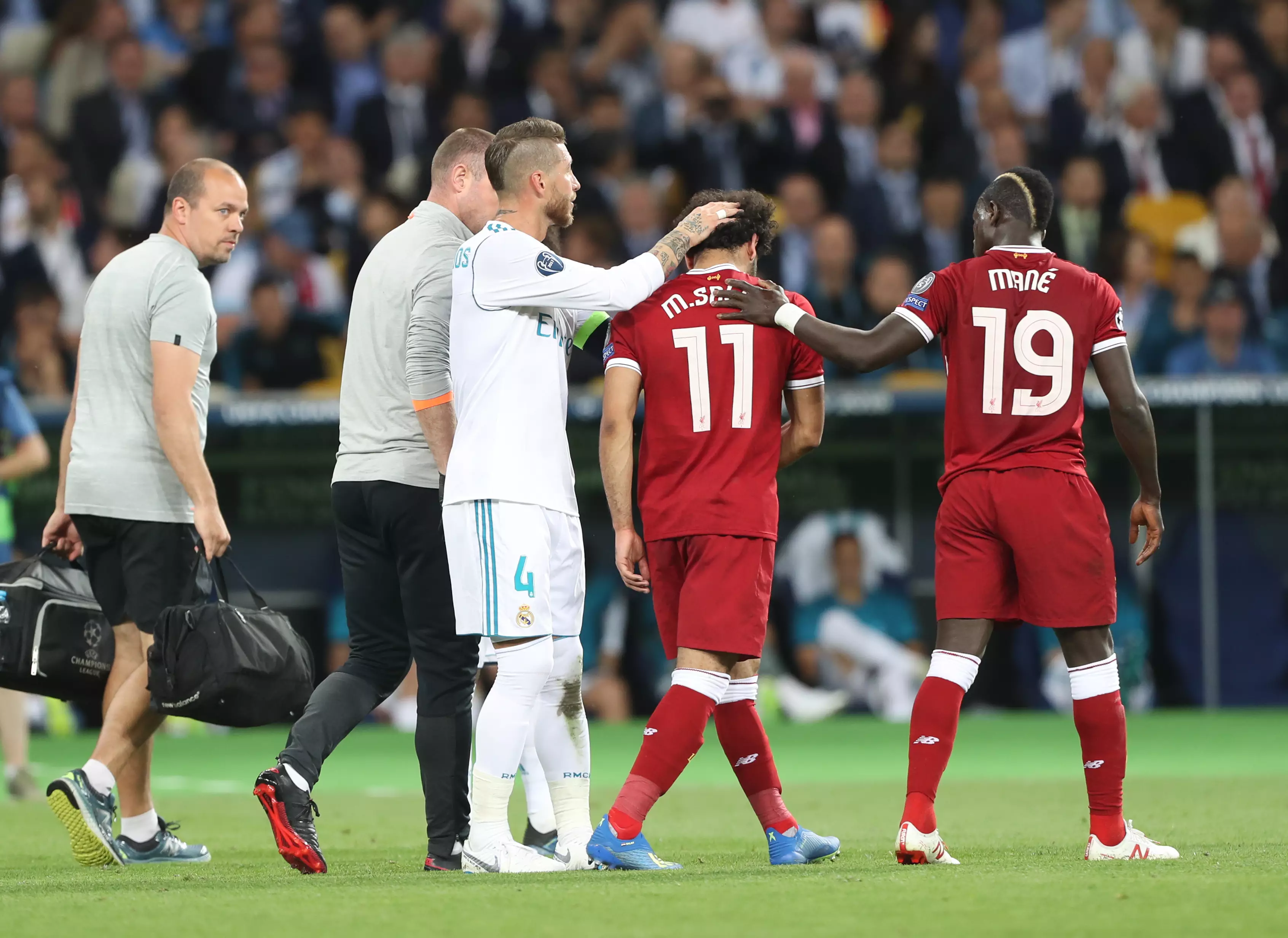 Ramos sees off Salah as the Liverpool forward goes off injured. Image: PA Images