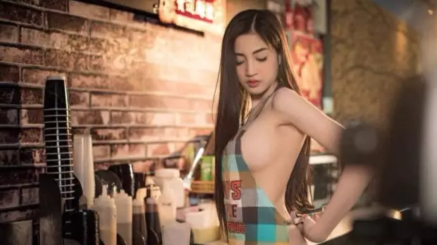 Cafe Owner Could Be Jailed After Using Near Naked Model To Sell Coffee