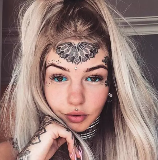 Amber Luke with only a few of her trademark tattoos.