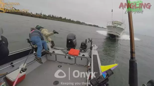 Fishermen Dive Into Water Seconds Before A Speedboat Almost Kills Them