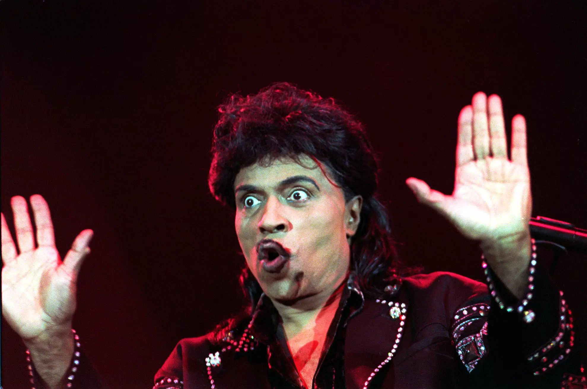 Little Richard performing on stage during the Legends of Rock 'n' Roll one-off concert held at the London Arena.