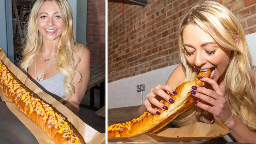 Woman Demolishes Three-Foot-Long Hot Dog And She's Our New Hero 