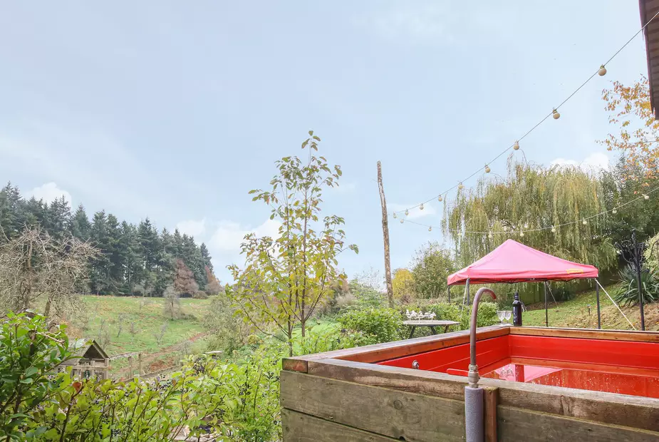 There's even a hot tub where you can soak as you look out to countryside views (