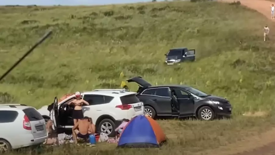 Picnickers Have Narrow Escape As Runaway Car Speeds Down Hill Towards Them