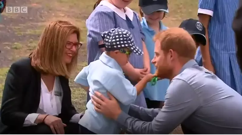 ​Prince Harry Receives Hug From Kid With Down Syndrome In Australia