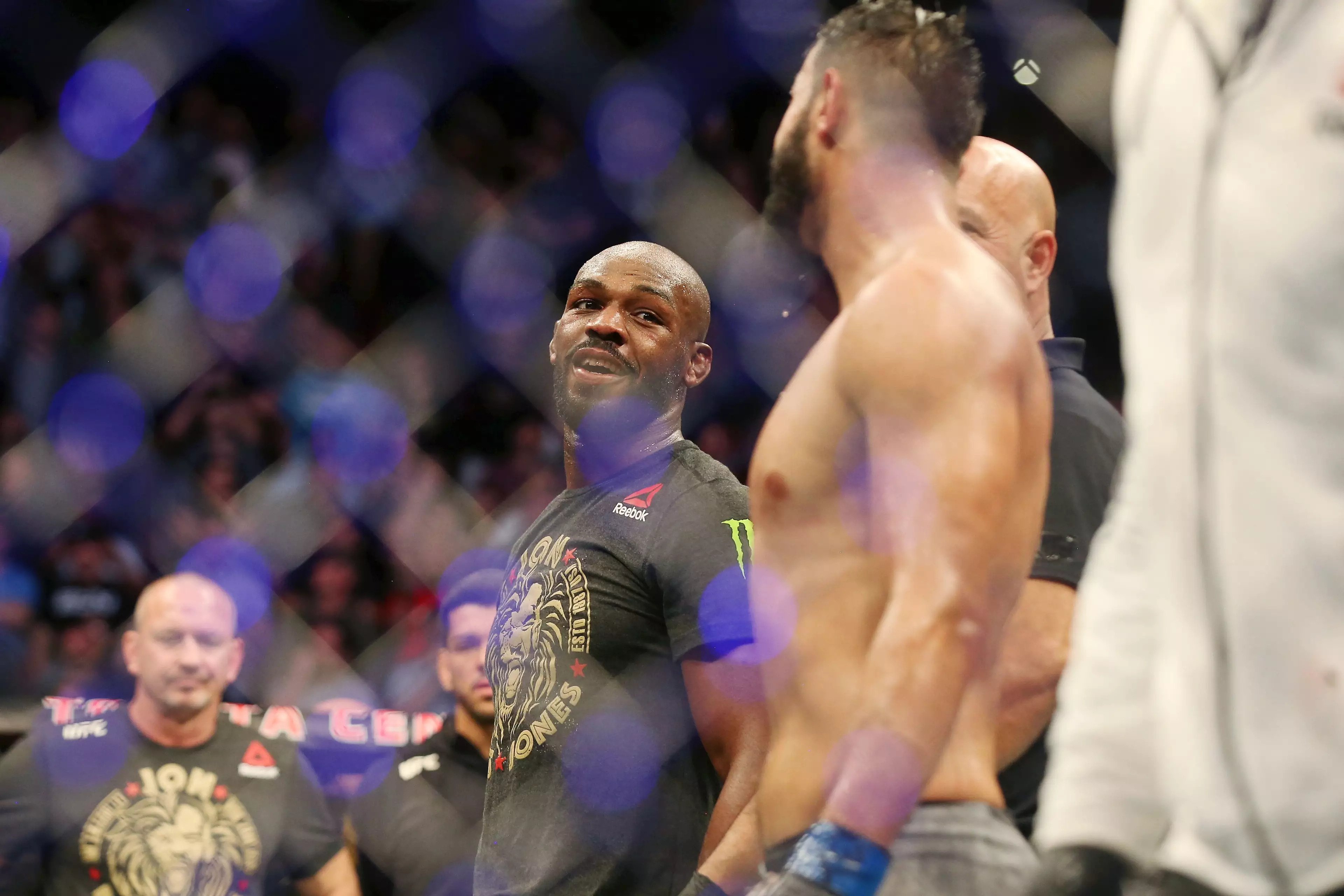 Jones gives Reyes a knowing look after their controversial fight. Image: PA Images 