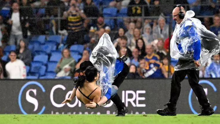 Pitch Invader Cops HUGE Hit During Eels & Titans NRL Clash