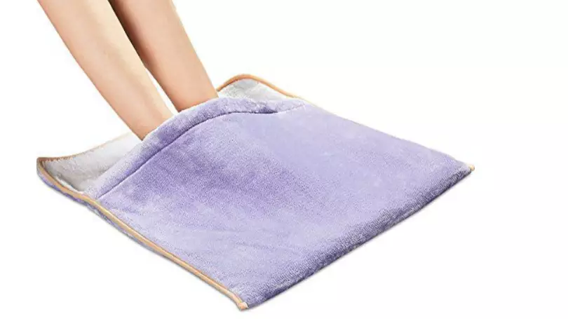 These Heated Pads Are Like Mini Sleeping Bags For Your Feet